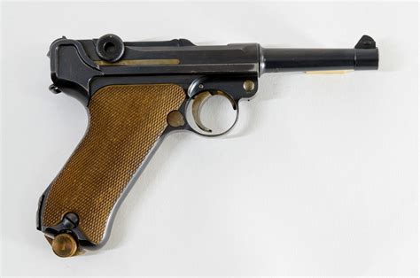 The commercial M06 Luger included a rearward-operating safety lever, and a breech stop that held the action open after the last round in the magazine had been fired. The P08 is undoubtedly the most famous of all Luger pistols. They became the standard German military sidearm in 1908, a distinction they held until the adoption of the Walther P38 ...